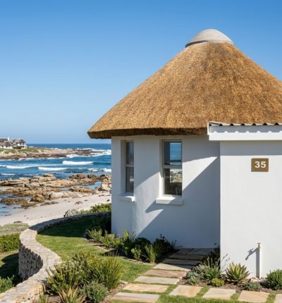 Premium high-density thatched roof and custom roundhouse timber construction by Thatch Africa along the Eastern Cape coastline.